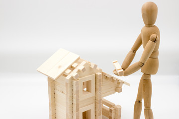 House repair (wooden dummy repairs house model from wood)