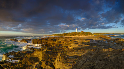 Summer morning golden light on Norah Head Light House, Central Coast, NSW, Australia