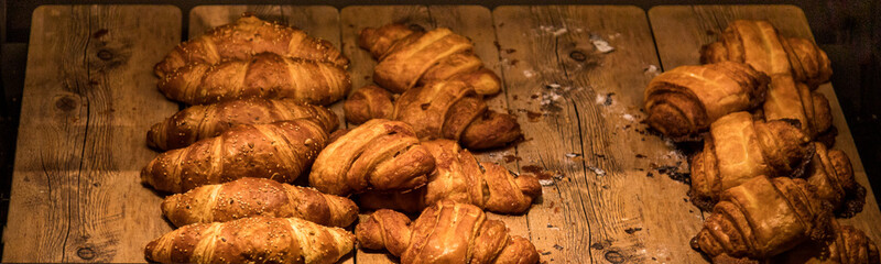 delicious croissants at the bakery on wood