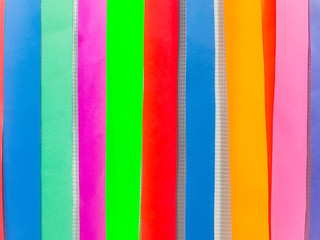 Colored paper strips decorate on board