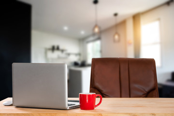  workspace with computer, laptop, office supplies, and coffee cup, smartphone, and tablet at office. desk work concept. in morning light