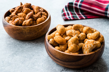 Almond Nuts with Barbeque Sauce and Spicy Cashew with Taco Spice in Wooden Bowl.
