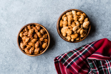 Almond Nuts with Barbeque Sauce and Spicy Cashew with Taco Spice in Wooden Bowl.