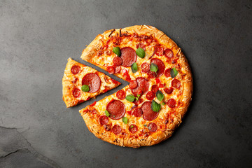 Pizza with salami and chorizo