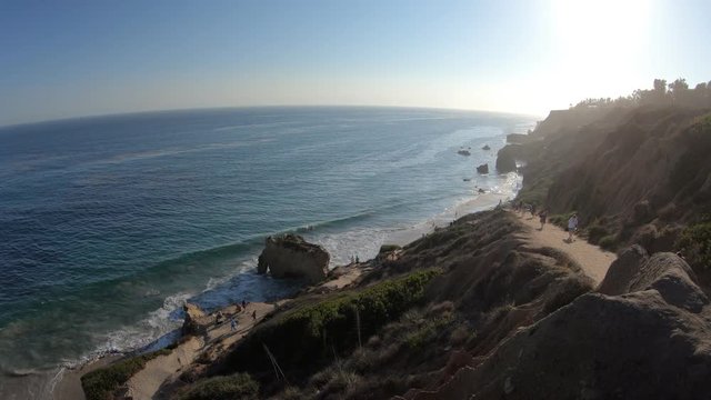 Panoramic view from coastal walk leading down to El Matador State Beach at sunlight. Pacific coast in California, United States. Pillars, boulders and rock formations of most photographed Malibu beach
