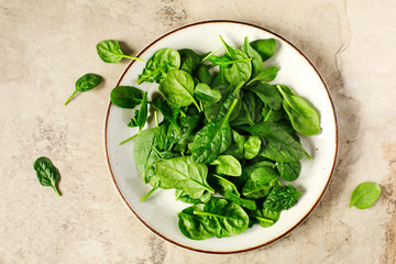 Fresh spinach on plate.