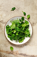 Fresh spinach on plate.