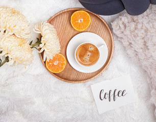 Morning at home concept. tray standing on the bed, top view