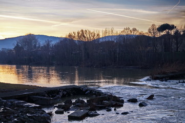 Visions walking along the Arno river, near Florence, at dawn