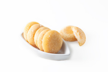 Asian, Thai food ingredient organic palm sugar in boat ceramic cup on white background