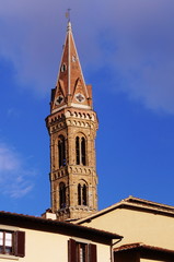 Fototapeta na wymiar Bell Tower of the Badia Fiorentina in Florence, Italy