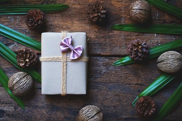 Eco friendly gift boxes wrapped with brown paper, green happy new year present concept