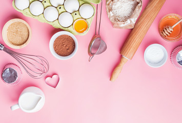 Tools and ingredients for making sweet bakery like pie or cupcakes.