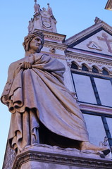Fototapeta na wymiar Statue of Dante Alighieri in Santa Croce square, Florence, Italy