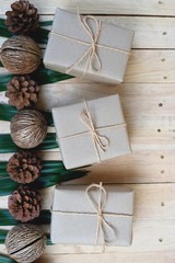 Eco friendly gift boxes wrapped with brown paper, green happy new year present concept