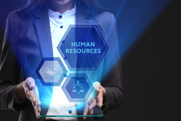 The concept of business, technology, the Internet and the network. A young entrepreneur working on a virtual screen of the future and sees the inscription: Human resources