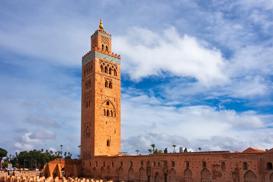 Koutubia mosque largest in Marakech. One of most popular landmarks of Morocco. Ornamented with curved windows, a band of ceramic inlay, pointed merlons, and decorative arches