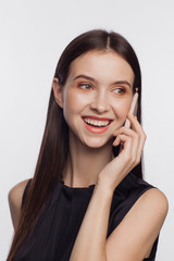 Portrait of a woman talking by phone