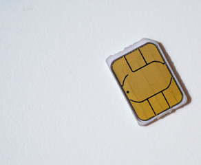 macro close-up shot of nano sim card 5g ready on white background. flat lay from the top
