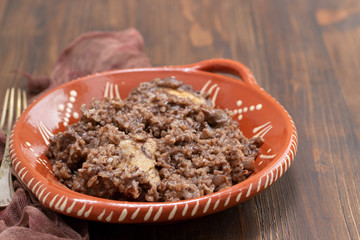 chicken with rice on ceramic dish
