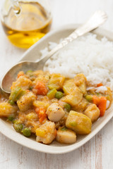 squid stew with boiled rice on dish