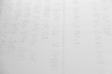 Fototapeta premium Braille is the font for the blind, invented by Louis Braille. The French blind teacher is a small convex dot in a six-point box, which is arranged alternately into code.