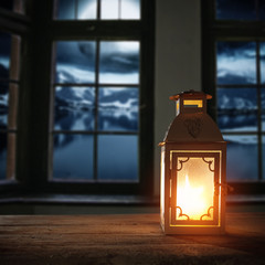 Obraz premium Winter lamp on table and free space 