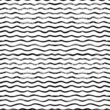 Seamless pattern with hand drawn waves. Hand drawn vector ornament for wrapping paper.