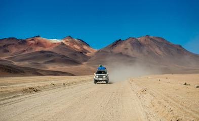 Car riding in Bolivian sunshine landscape