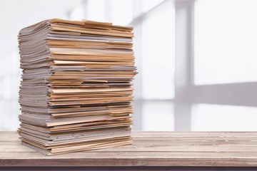 File folders with documents on background