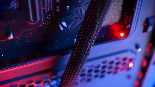 Cable close-up shooting of computer inside with details and system unit, processor