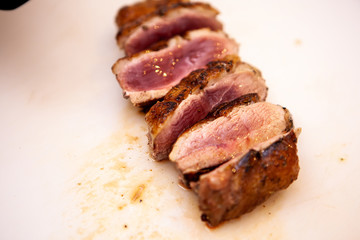 Perfect cooked duck berast in restaurant kitchen. Chef making delicious meal