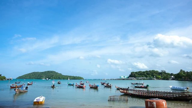 4K Time lapse of Longtail fishing boats in the tropical sea at phuket thailand