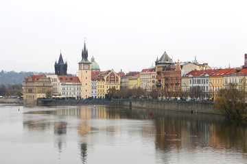 Fototapeta na wymiar View of Prague from the Vltava river in cloudy day