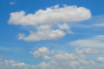 Naklejka na ściany i meble View of beautiful white clouds on a blue sky