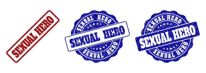 Obraz premium SEXUAL HERO grunge stamp seals in red and blue colors. Vector SEXUAL HERO labels with grunge style. Graphic elements are rounded rectangles, rosettes, circles and text labels.