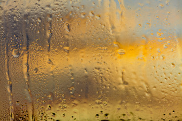 Cold November dawn through a frozen window.