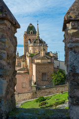 JEREZ DE LOS CABALLEROS, BADAJOZ, SPAIN - NOVEMBER 24, 2018: Church of Santa María de la Encarnacion seen from the city walls