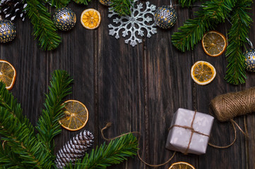 Fototapeta na wymiar new year wooden background with festive decor.