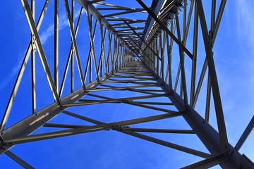 Electric antenna and communication transmitter tower in a german landscape