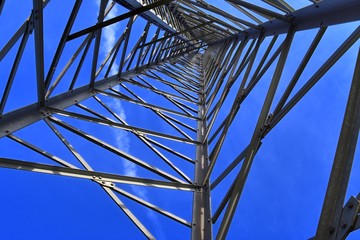 Electric antenna and communication transmitter tower in a german landscape