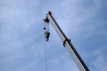 Developing countries rely on machinery for their work.Crane is a machine used in construction.