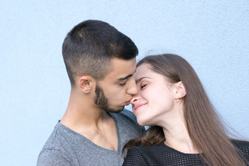 Two loving people together posing outside