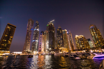 Fototapeta na wymiar Dubai, UAE - October, 2018. Skycrapers at Dubai Marina. Dubai marina at night night cityscape lights