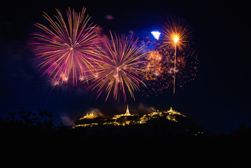 Fototapeta na wymiar Fireworks show over Phra Nakhon Khiri Historical Park (Khao Wang), Petchaburi, Thailand.