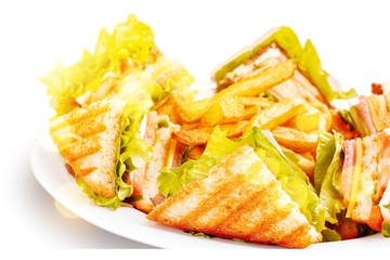 Grilled sandwiches with french fries on plate