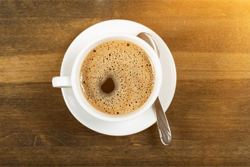 Coffee cup  on wooden background