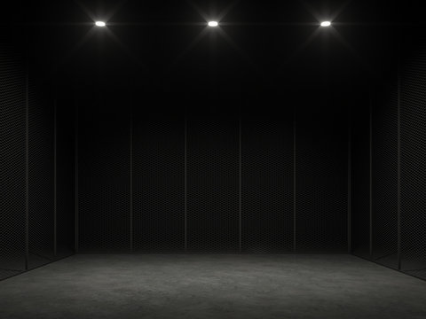 An empty cage in the dark 3d render.There is a polished concrete floor and a black steel wall with downlight shining down to the floor to show your product.