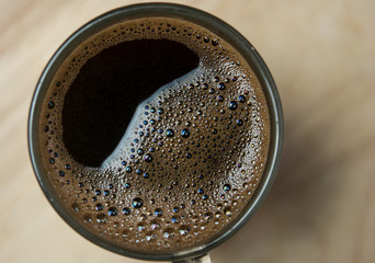 Close up of a coffee surface bubble.