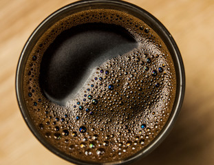 Close up of a coffee surface bubble.
